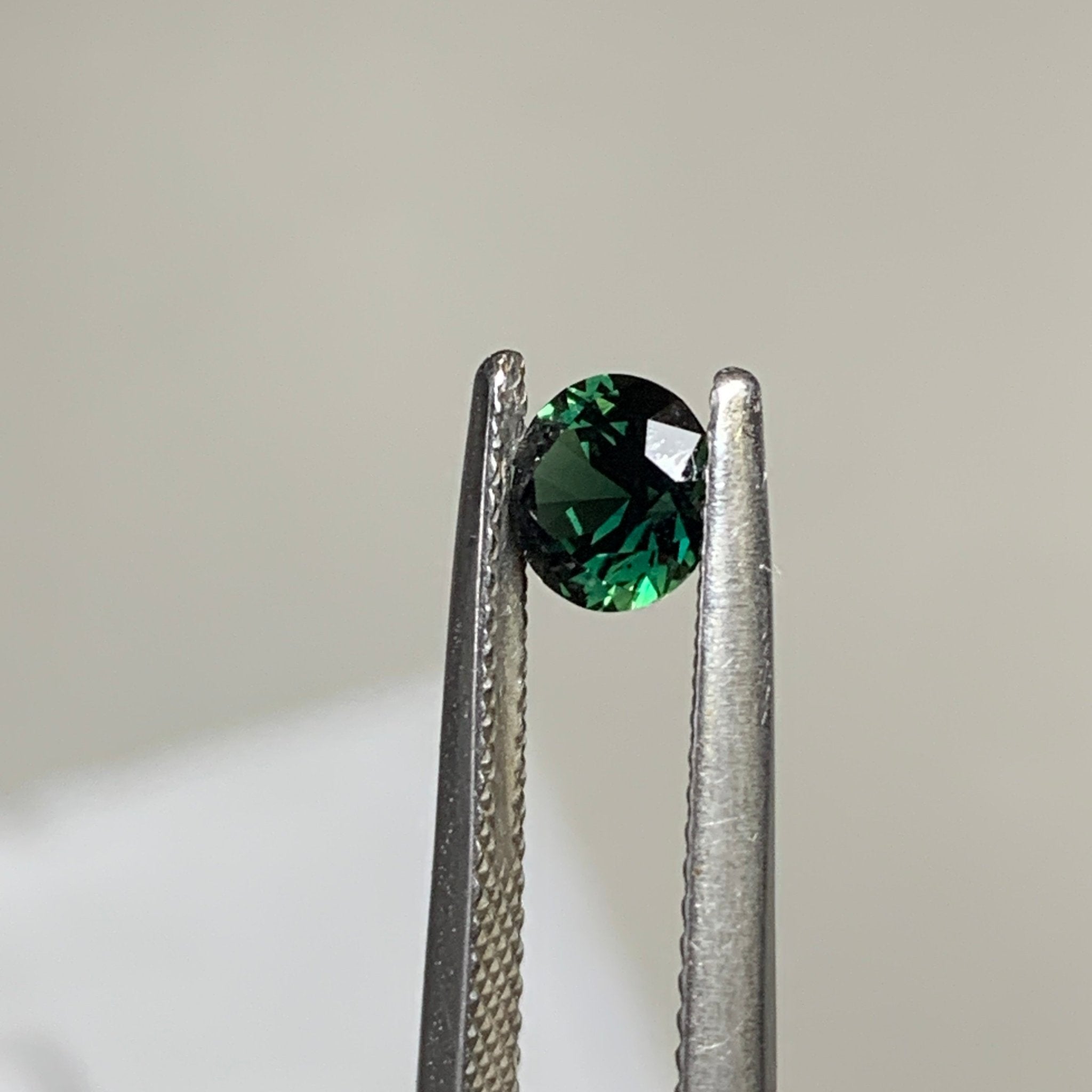 0.8ct Green Sapphire Round