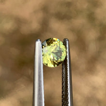 0.97ct Yellow Parti Sapphire, Round