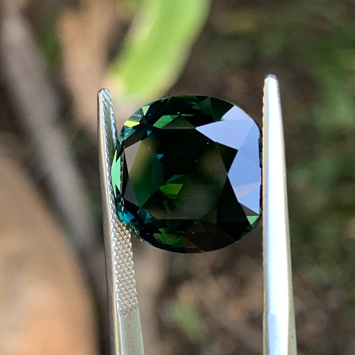 15.69ct Teal Australian Sapphire, Cushion