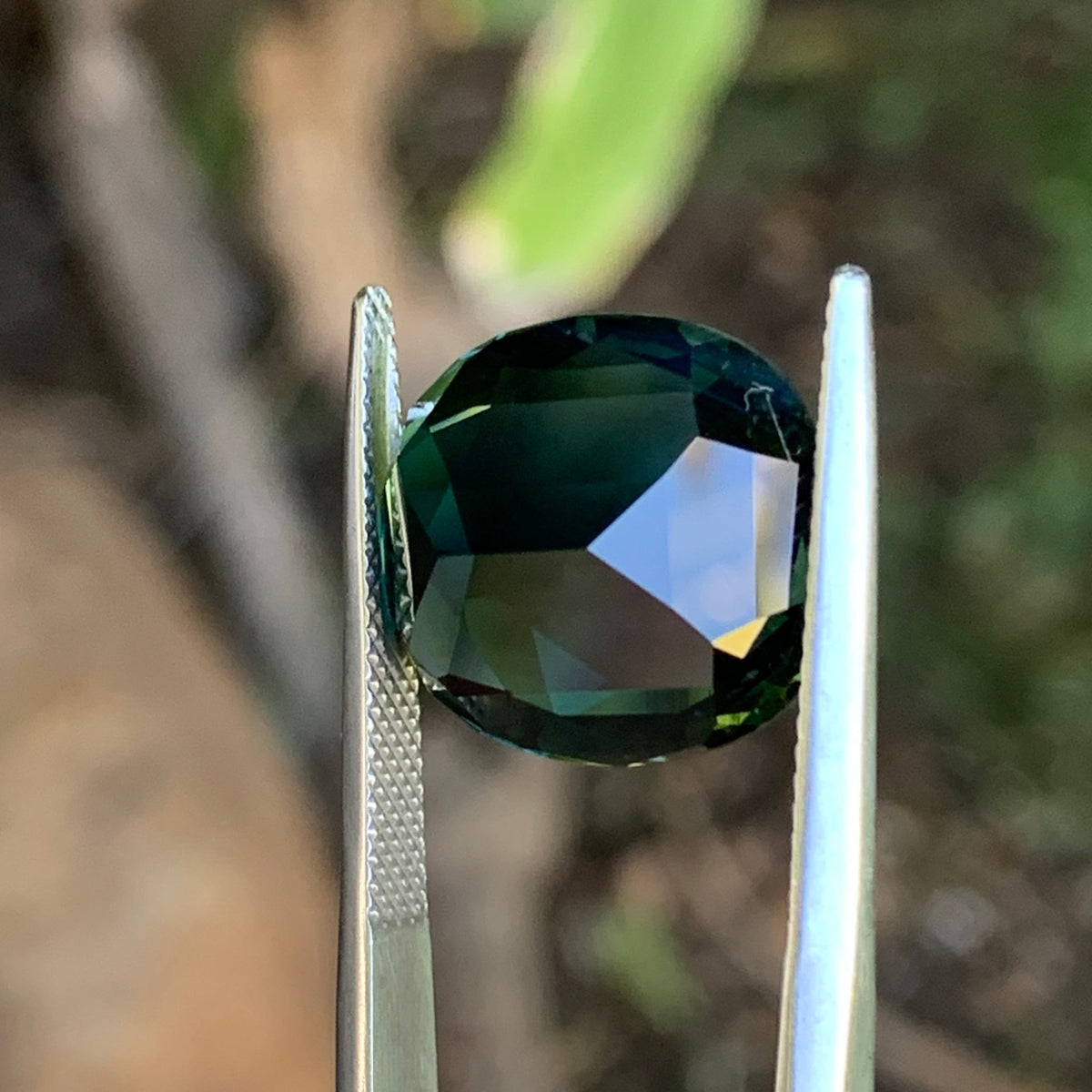15.69ct Teal Australian Sapphire, Cushion