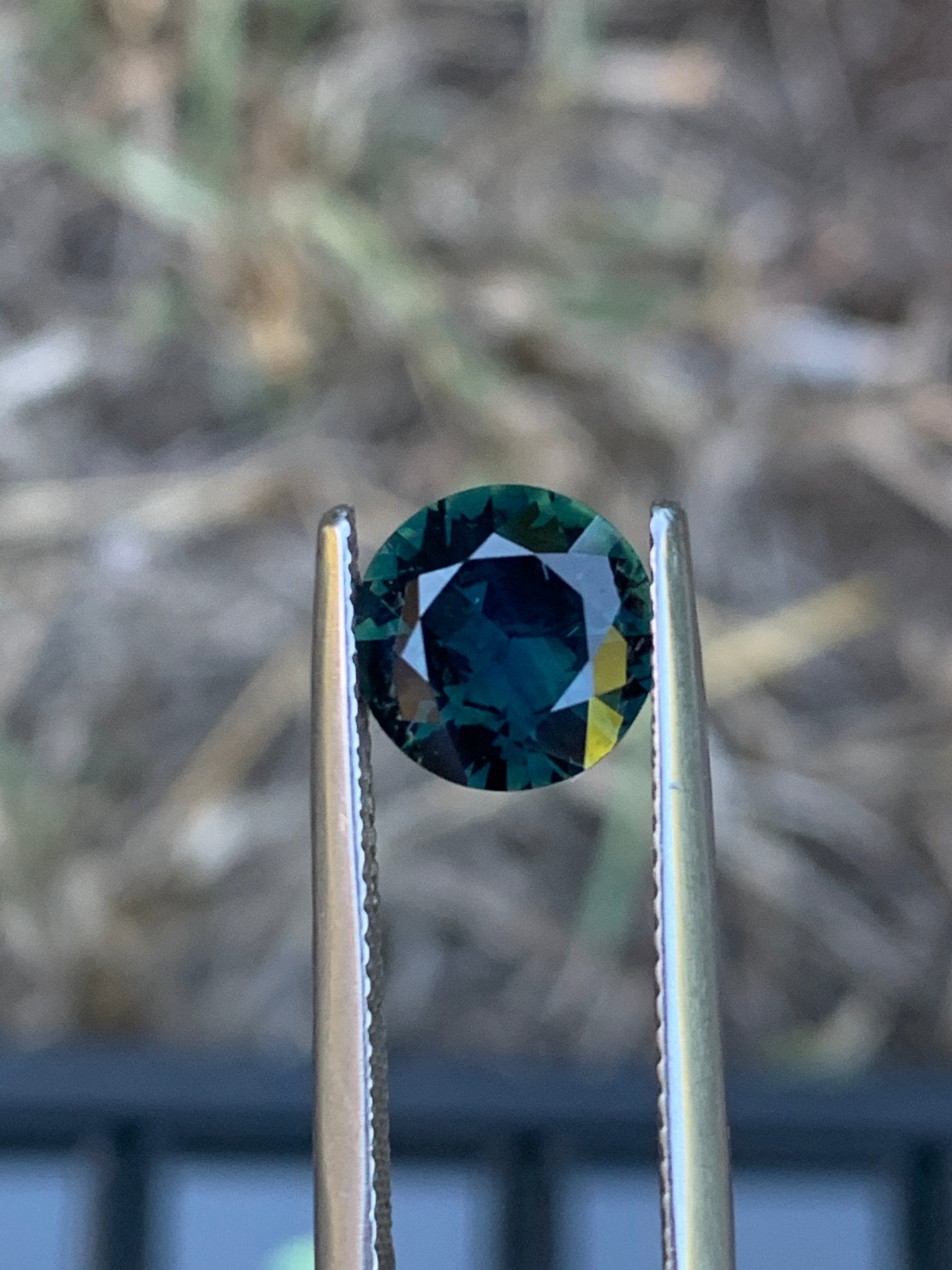 2.1ct Deep Green Sapphire Round