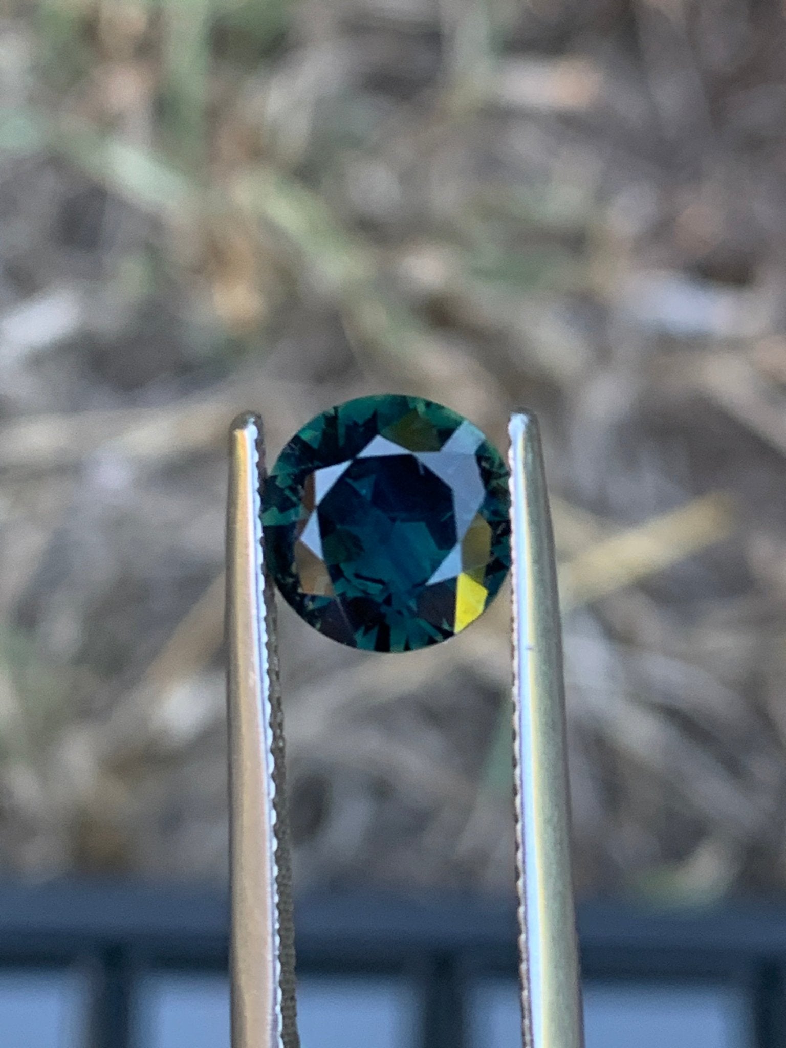 2.1ct Deep Green Sapphire Round