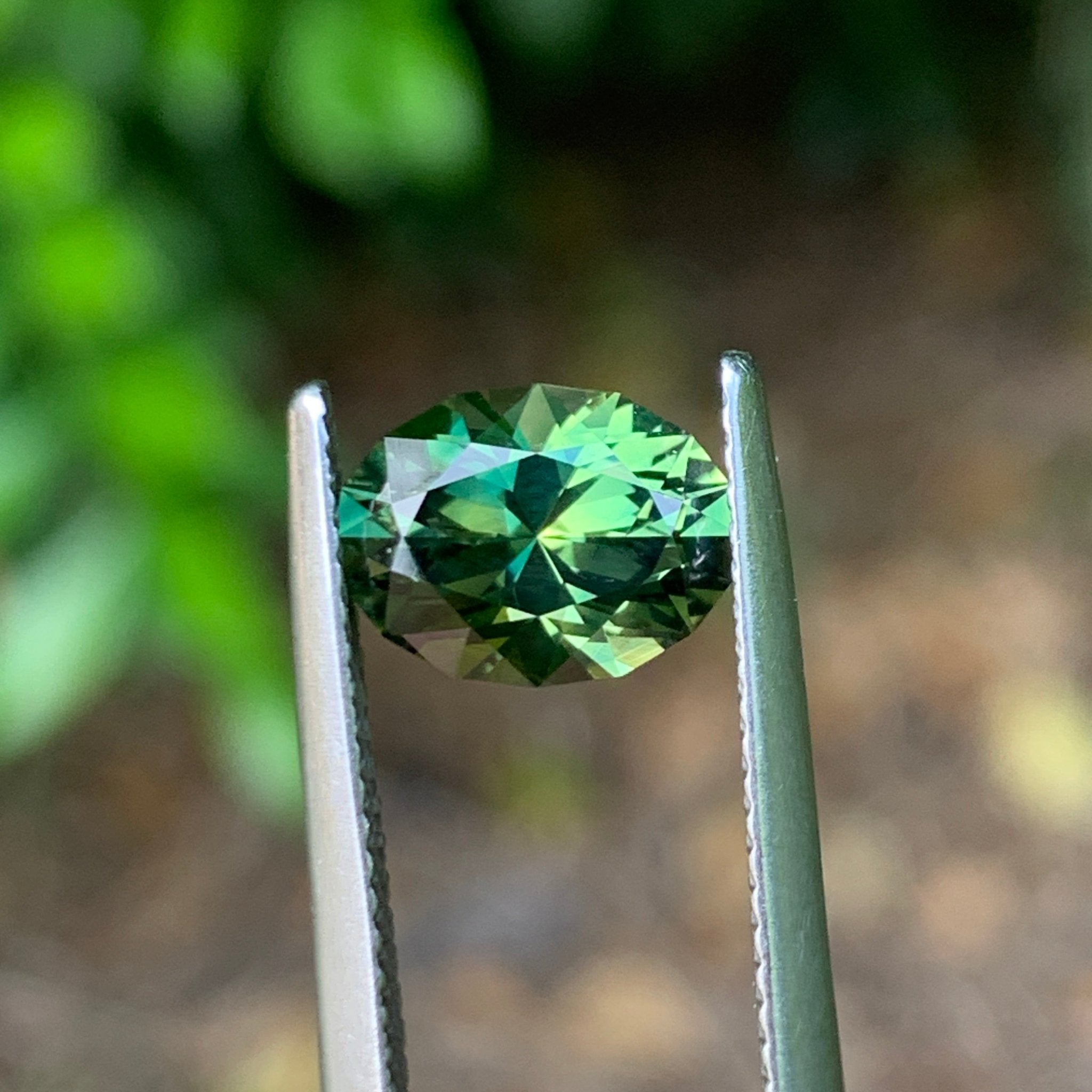 2.43ct Green Parti Sapphire Oval