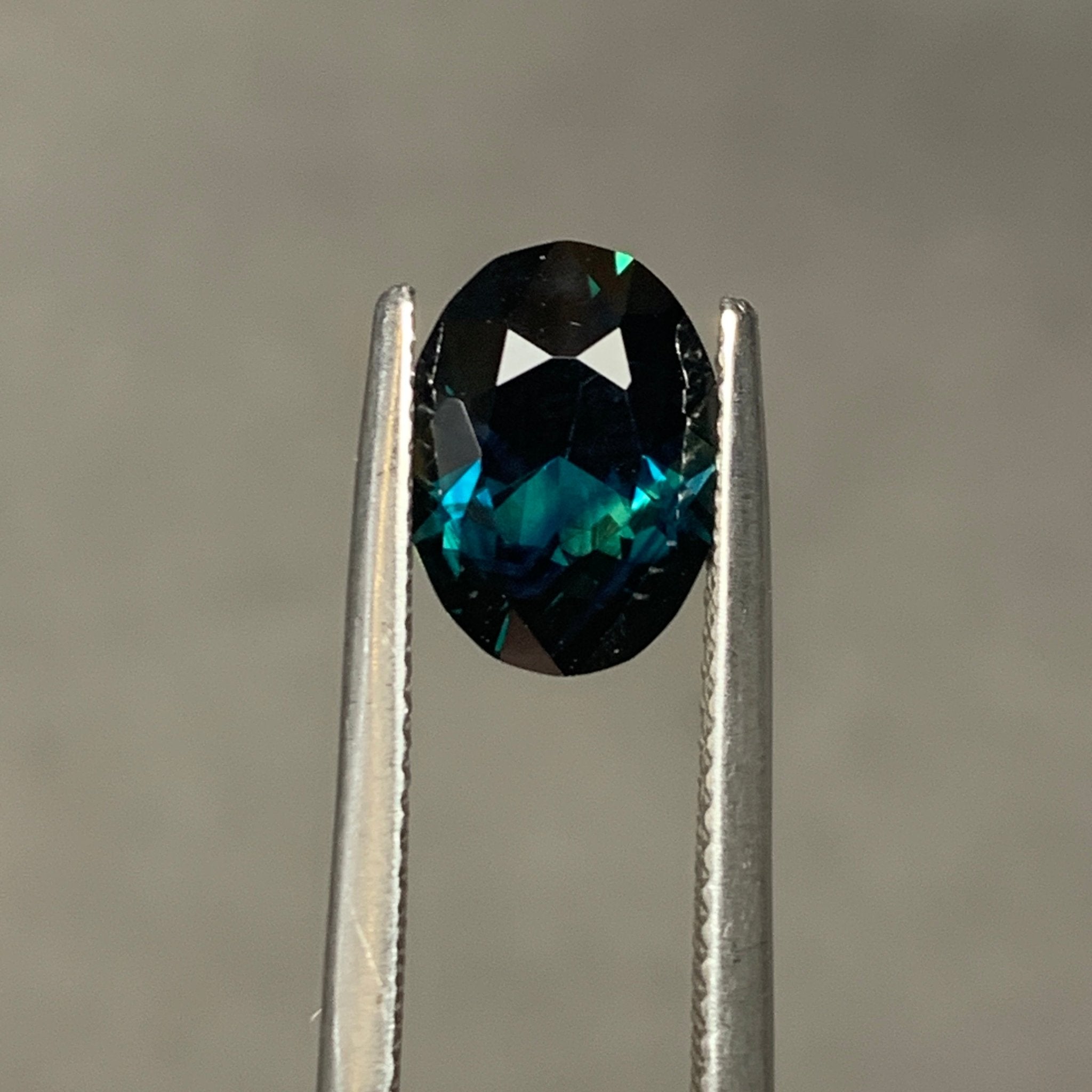 3.4ct Dark Teal Sapphire Oval