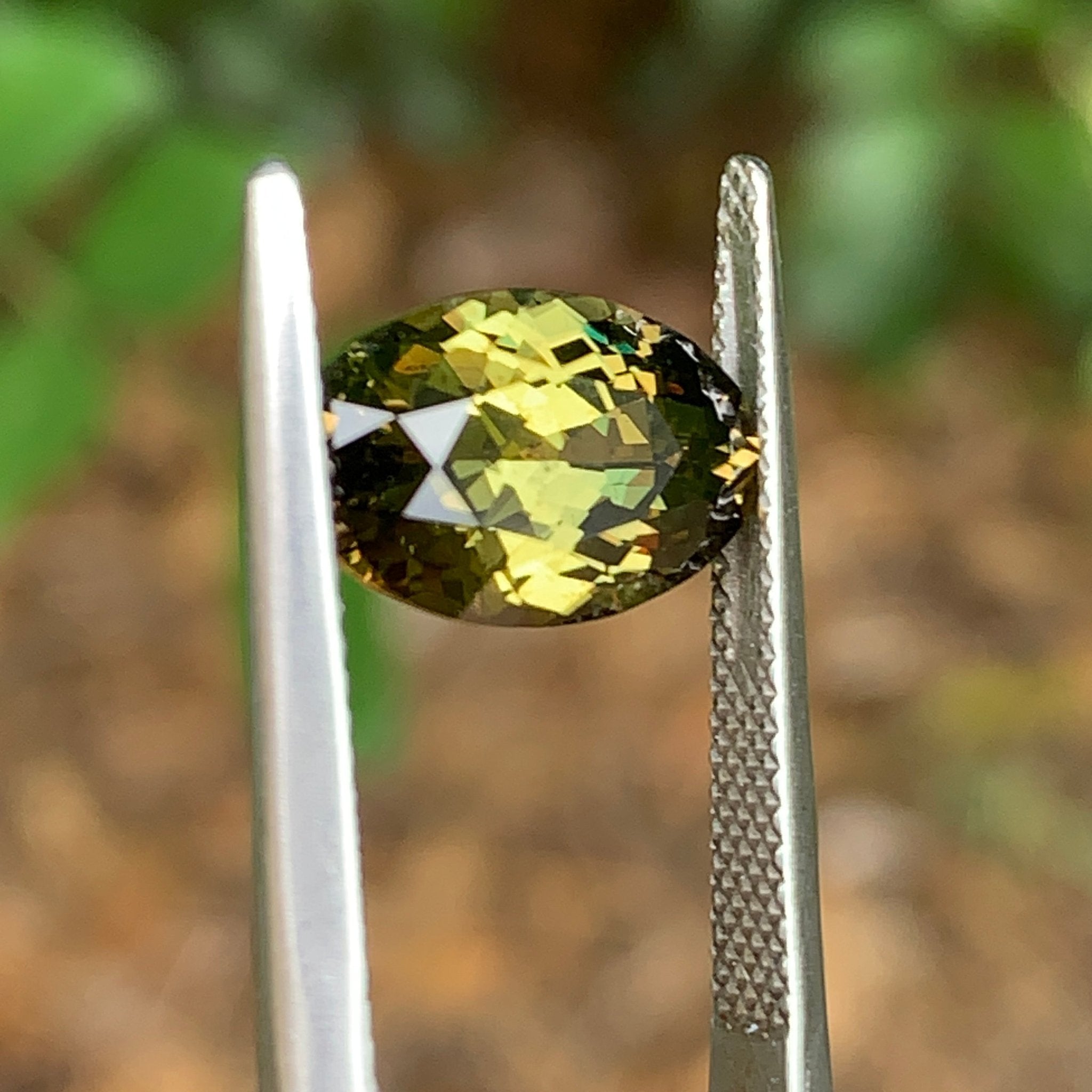 4.17ct Yellow Green Sapphire Oval