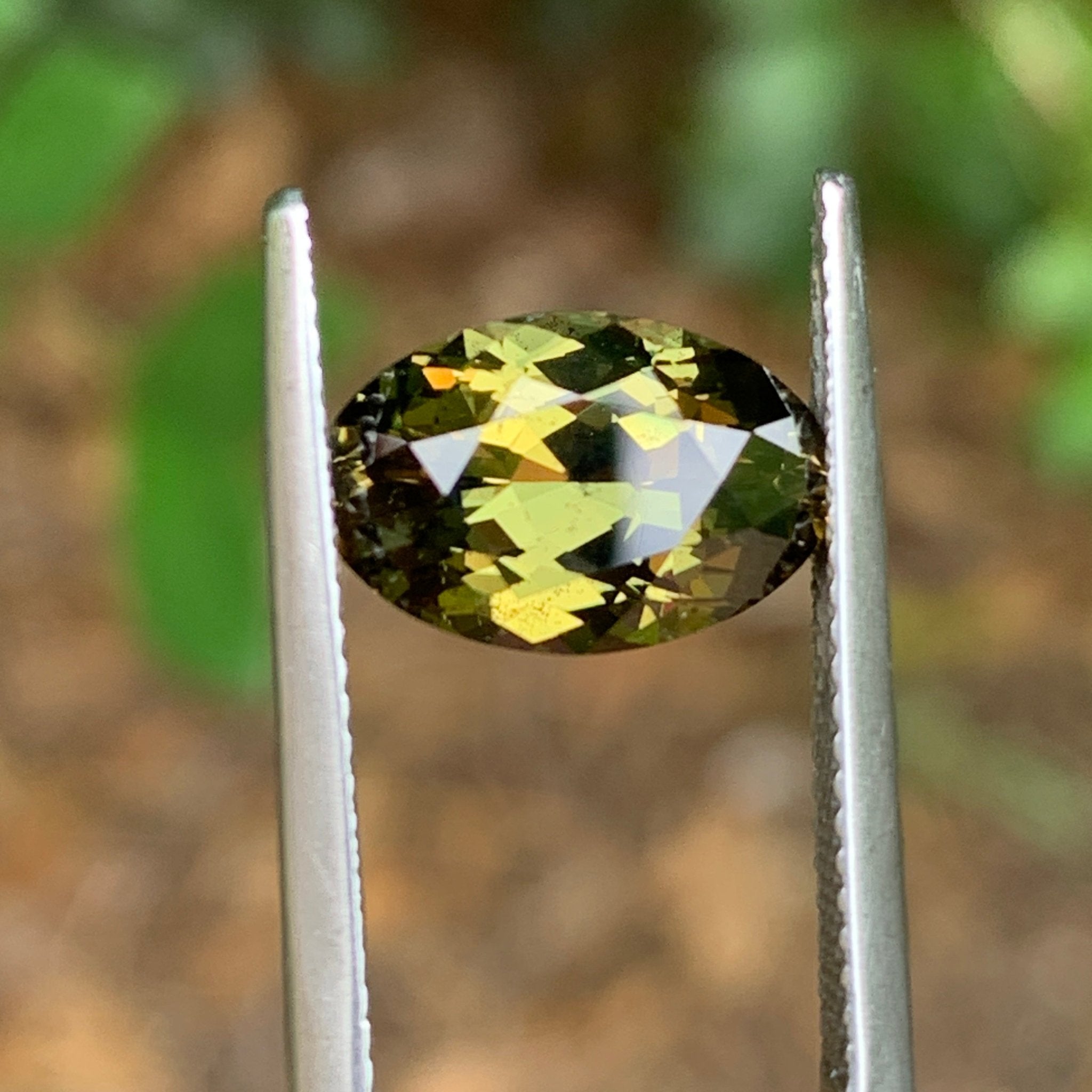 4.17ct Yellow Green Sapphire Oval