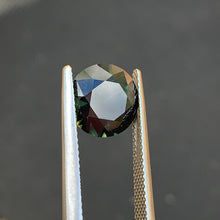 4.27ct Dark Parti Sapphire Round