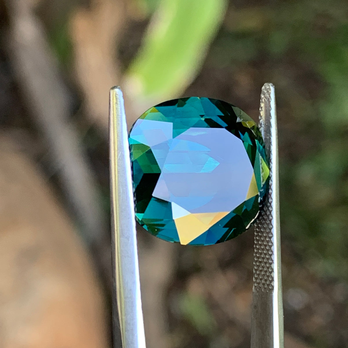 15.69ct Teal Australian Sapphire, Cushion