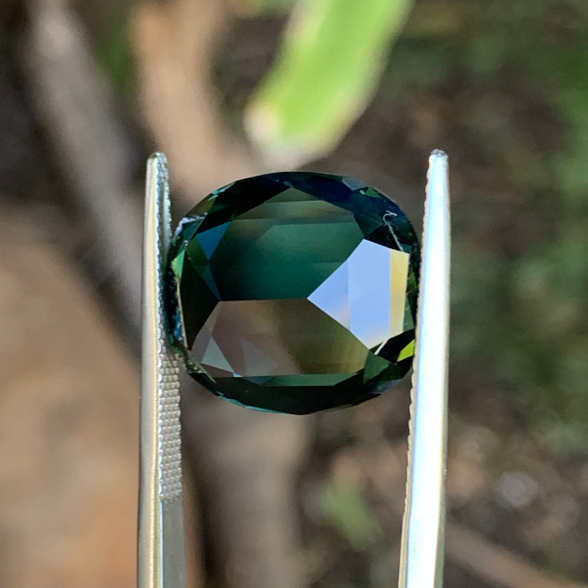 15.69ct Teal Australian Sapphire, Cushion