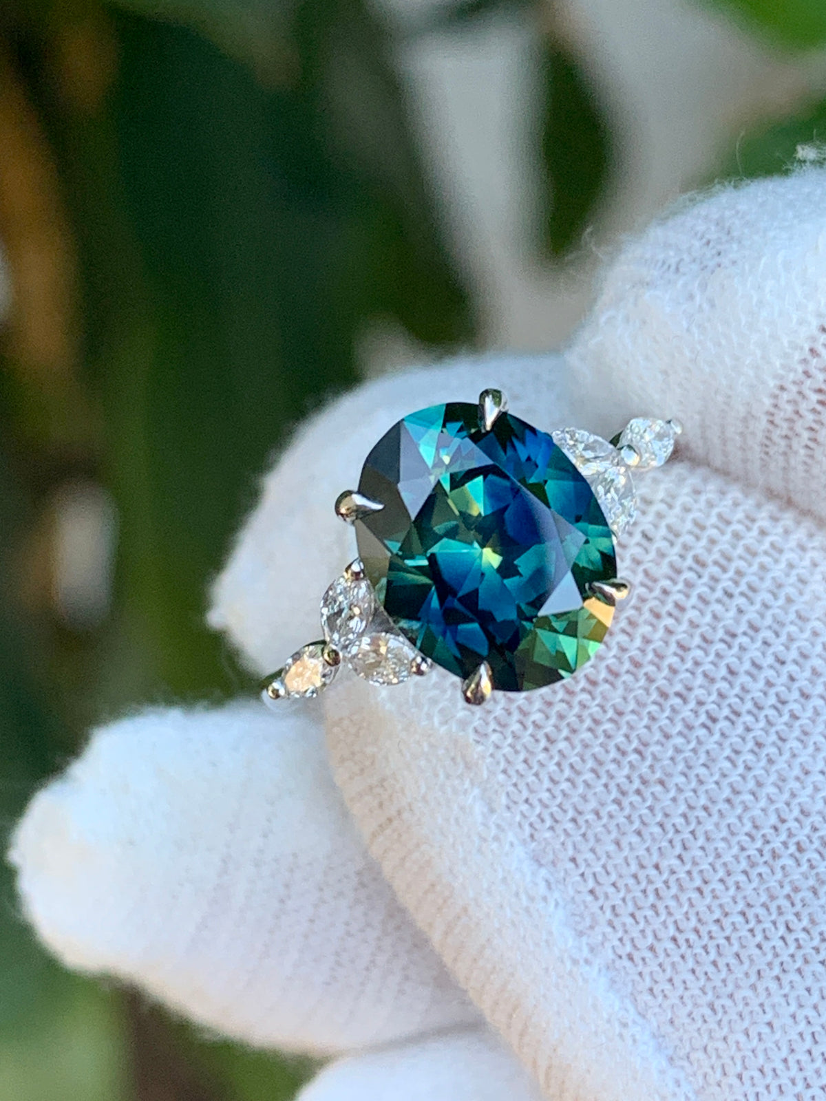 Finished teal sapphire ring