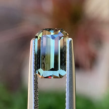 2.76ct Light Greenish Yellow Colour Change Sapphire, (Reddish under Incandescent light), Emerald Shape